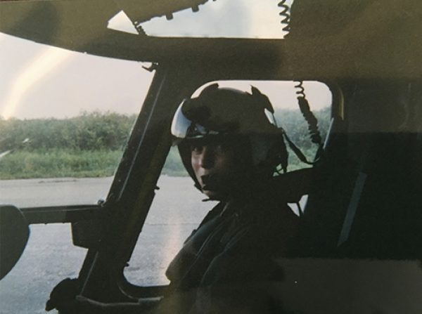 woman flying in a helicopter